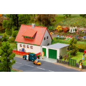 Terraced house with garage.