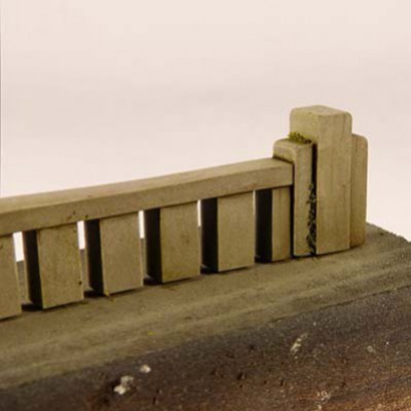 Small concrete wall.